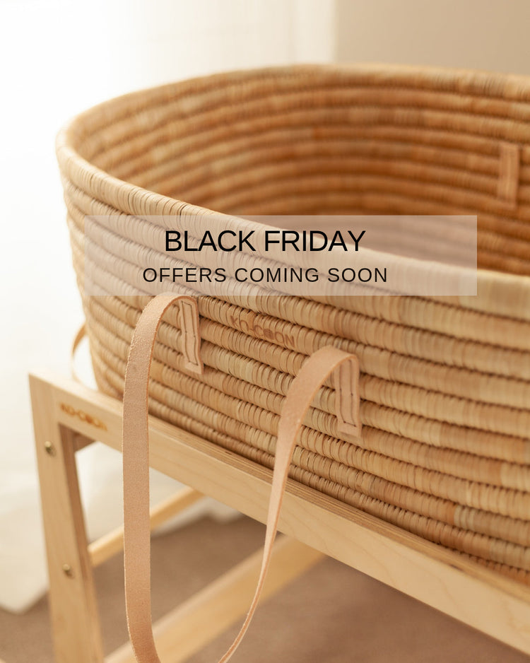 KO-COON Black Friday promotion featuring a woven Moses basket on a wooden stand
