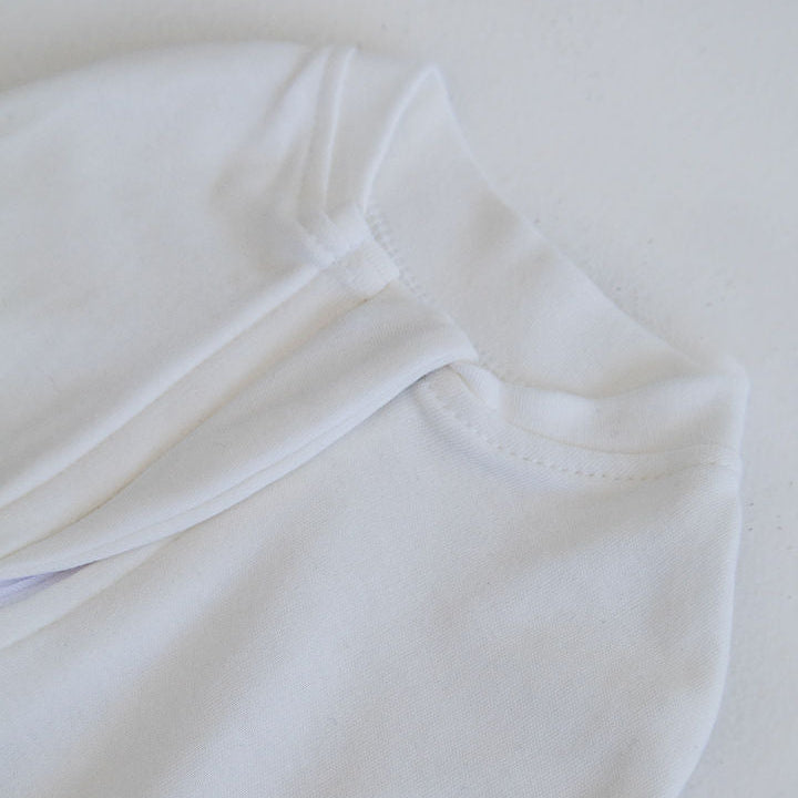 close up milky white zipped cotton