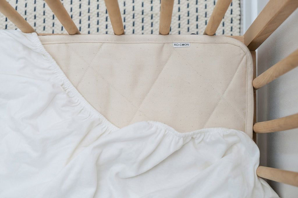 Merino quilted mattress padding protector Puddle Pad kocoon